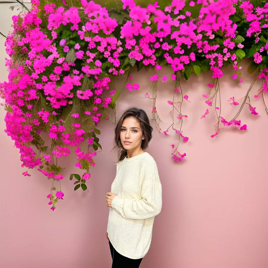 a woman wearing a long sleeve pullover