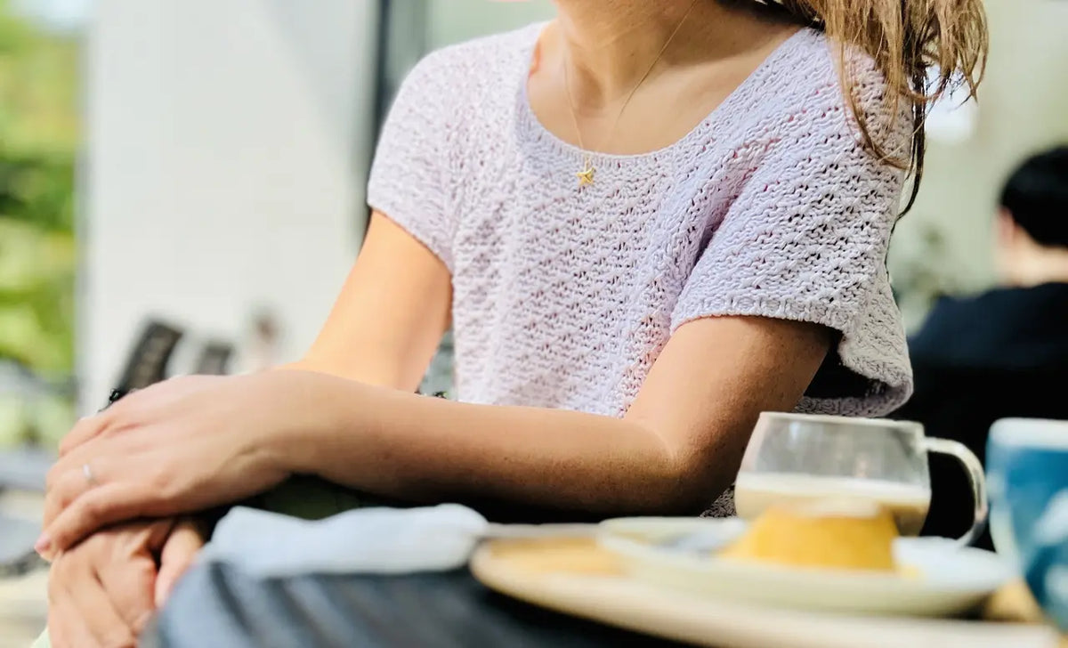 a woman wearing our cozy sweater